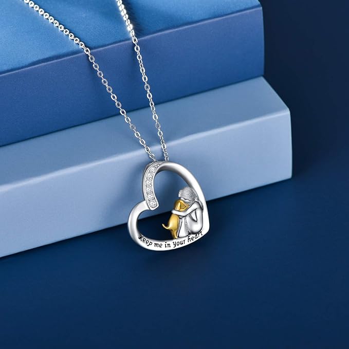 Zilveren ketting met hartje met hond en zirkonia steentjes