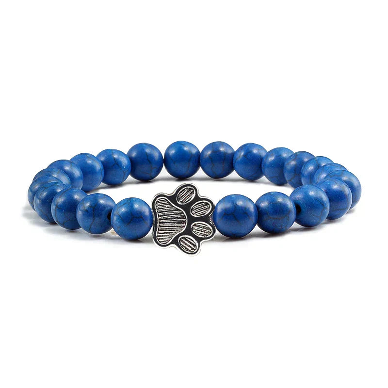 Armband met pootafdrukken versierd met kralen