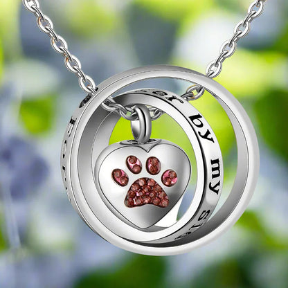 Ketting met urn in de vorm van een pootafdruk van roestvrij staal
