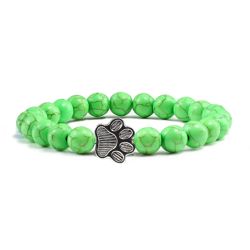 Armband met pootafdrukken versierd met kralen