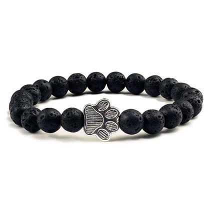 Armband met pootafdrukken versierd met kralen