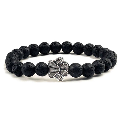 Armband met pootafdrukken versierd met kralen