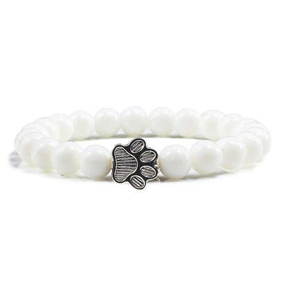 Armband met pootafdrukken versierd met kralen