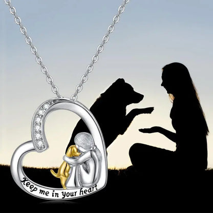 Zilveren ketting met hartje met hond en zirkonia steentjes